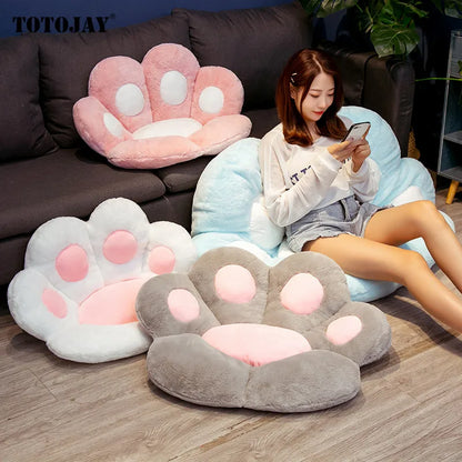 Asiento tipo almohada con forma de pata de oso y gato