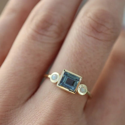 Elegante anillo de piedras preciosas para mujer.