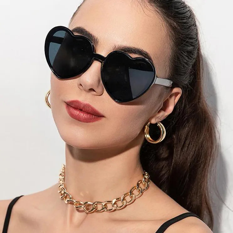 Lunettes de soleil tendance sans monture en forme de cœur pour femmes