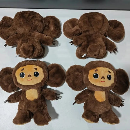 Belle peluche d'anime de singe avec de grands yeux singe