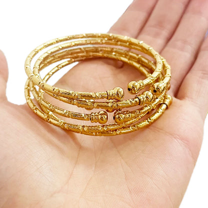 Pulseras africanas de oro para mujer