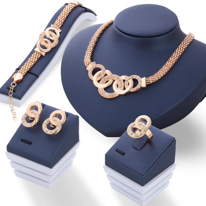Ensemble de bijoux bague, collier, boucles d'oreilles et bracelet pour femme
