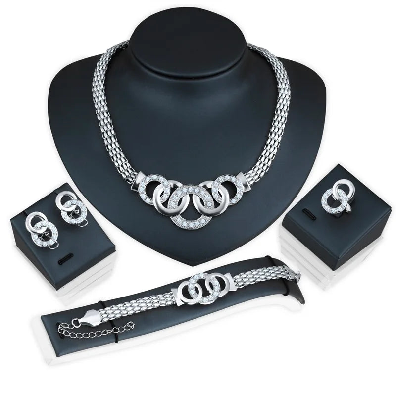 Conjunto de joyería de anillo, collar, aretes y pulsera para mujer